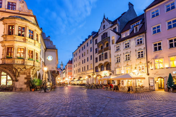 Stock photograph of restaurant patios on Platzl square in downtown Munich Germany