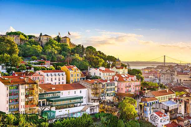 Lisbon, Portugal old town cityscape at dusk. Lisbon, Portugal old town cityscape at dusk.