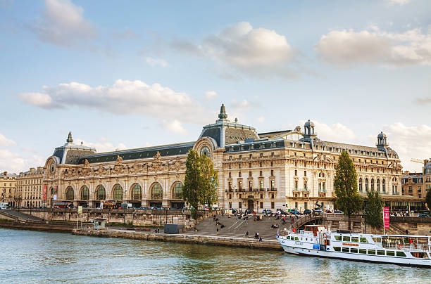 Paris, France - October 9, 2014: D'Orsay museum with people in Paris, France. The Musee d'Orsay is the French art museum in Paris, on the left bank of the Seine.
